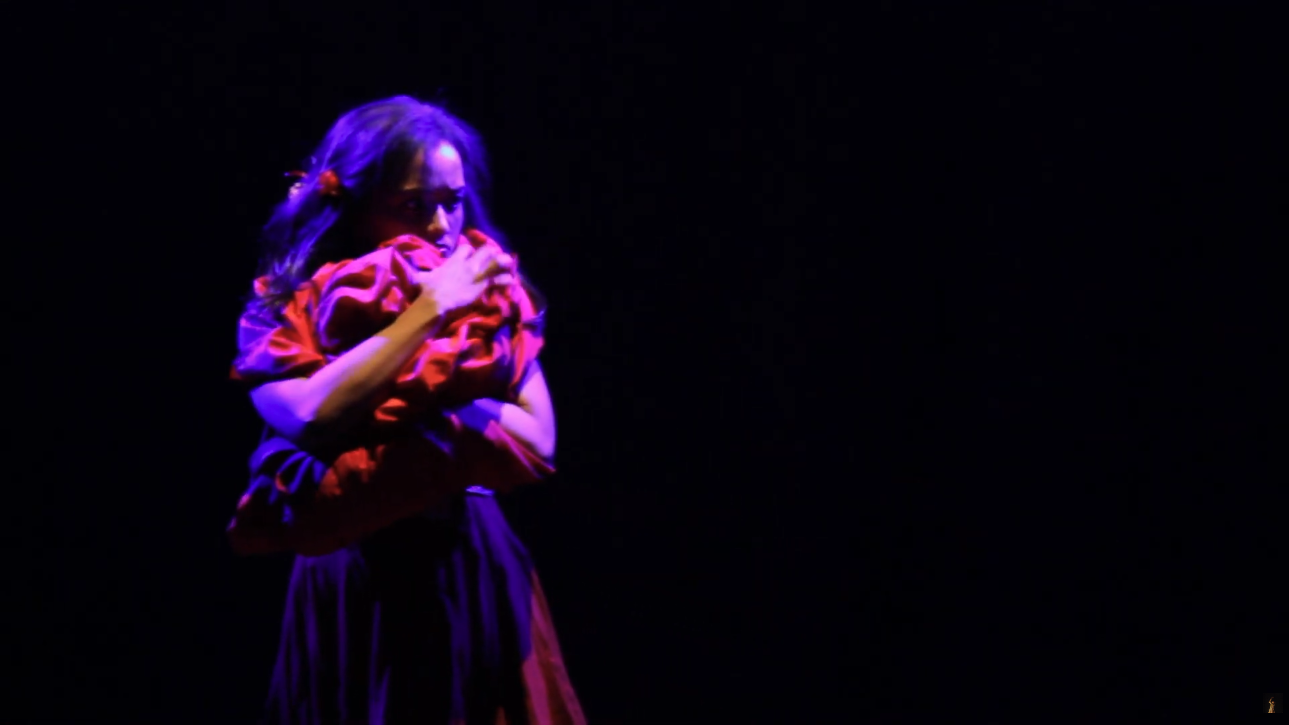 Shakuntala holds a red cloth during the farewell scene.